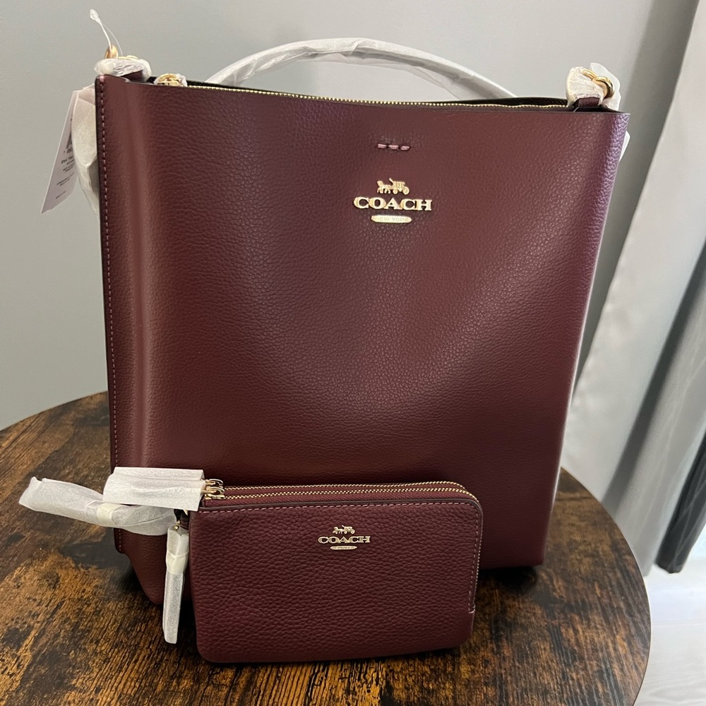 Coach Women's Mollie Bucket Bag 22 Crossbody Shoulder, Im/Wine Multi
With wallet